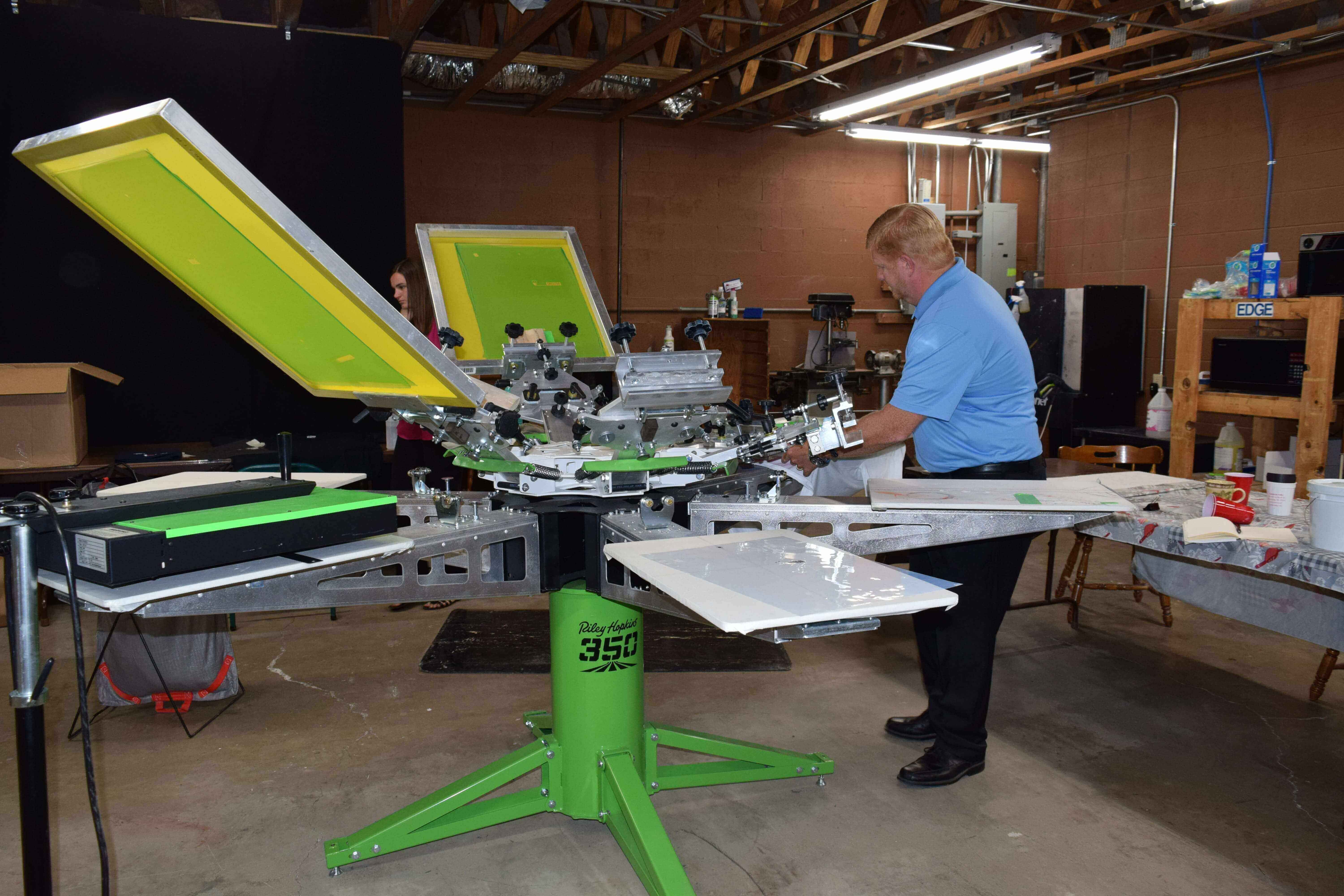 Acme Printing's new screen printing machine for custom tshirts in Morristown, TN.